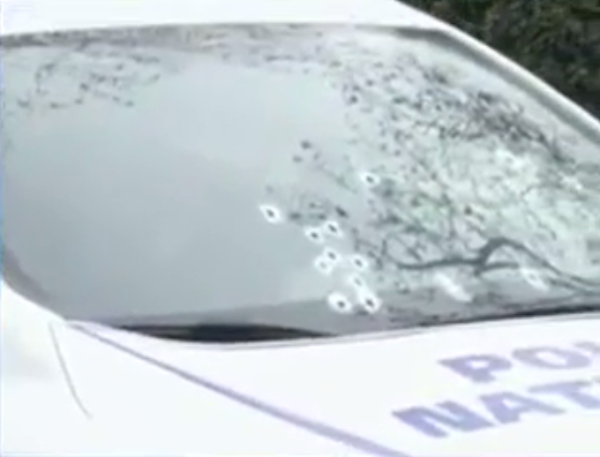 Windshield of police car. The terrorists were not amateurs.