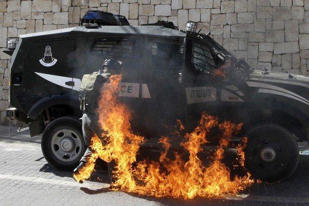 burning policeman