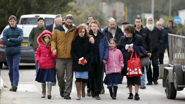 The family of Dafna Meir arrives for her funeral
